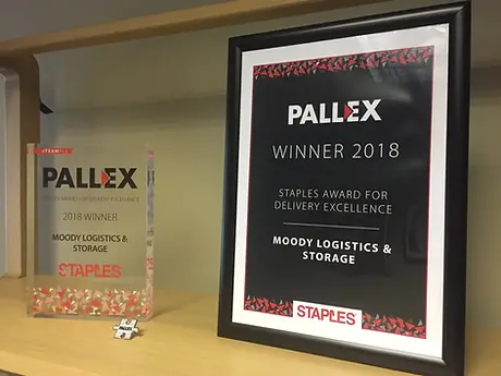 Awards standing on shelf on display