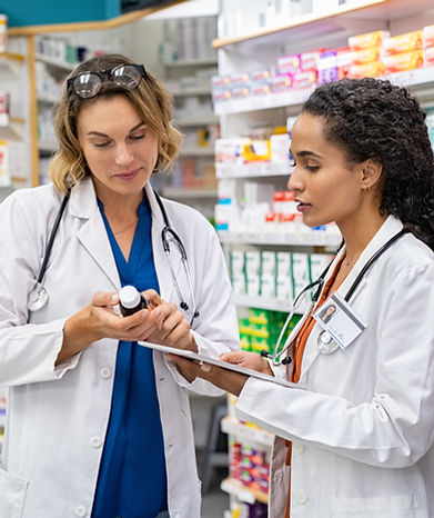 two-pharmacists-working-together-at-pharmacy-2021-08-28-07-35-07-utc (1).jpg