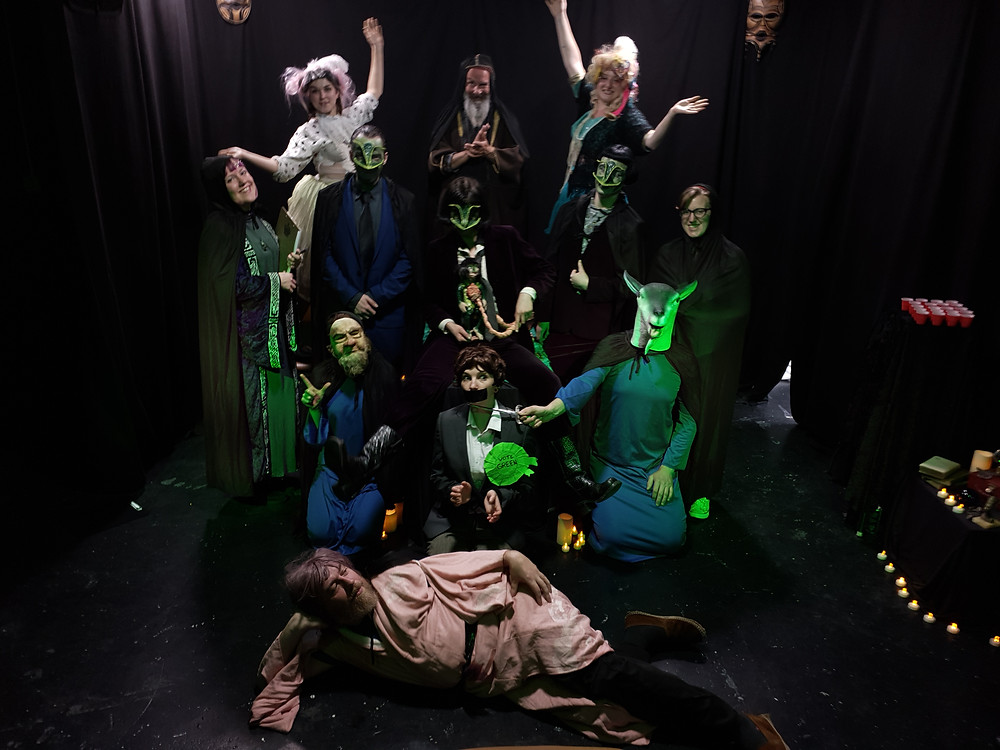 The cast of Wizards Against Lizards posing together on stage.