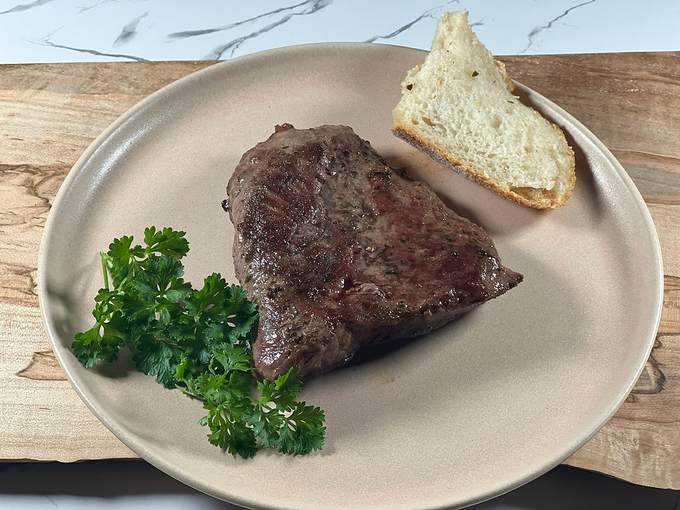 Juicy Flat Iron Steak, versatile for sandwiches, salads, or oven-roasted meals.