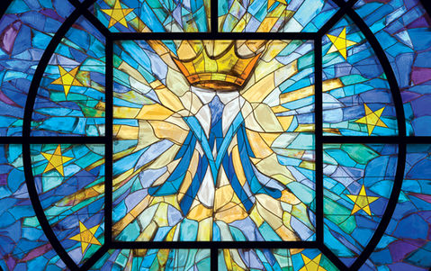 Marian stained glass transept window in the Catholic sanctuary at the Co-Cathedral of the Sacred Heart, Houston, part of custom liturgical design and sacred art.