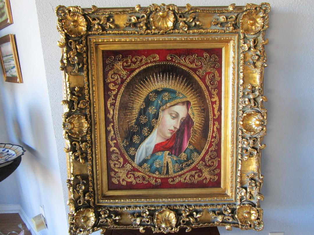 Catholic Virgin Mary painting depicting Marian devotional artwork in a gold frame.