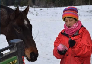 Sharon Starmer, co-founder of the Piece Of Heaven Project sanctuary, with a horse