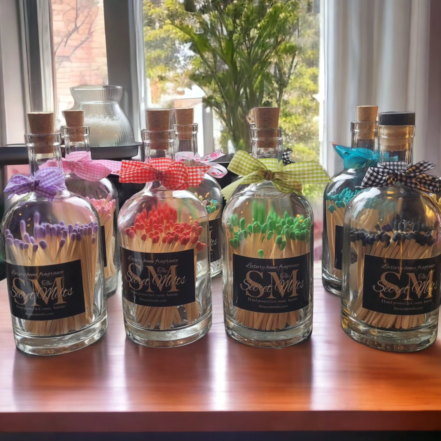 Large bottle of coloured tipped safety matches. No Slogan, just logo. 