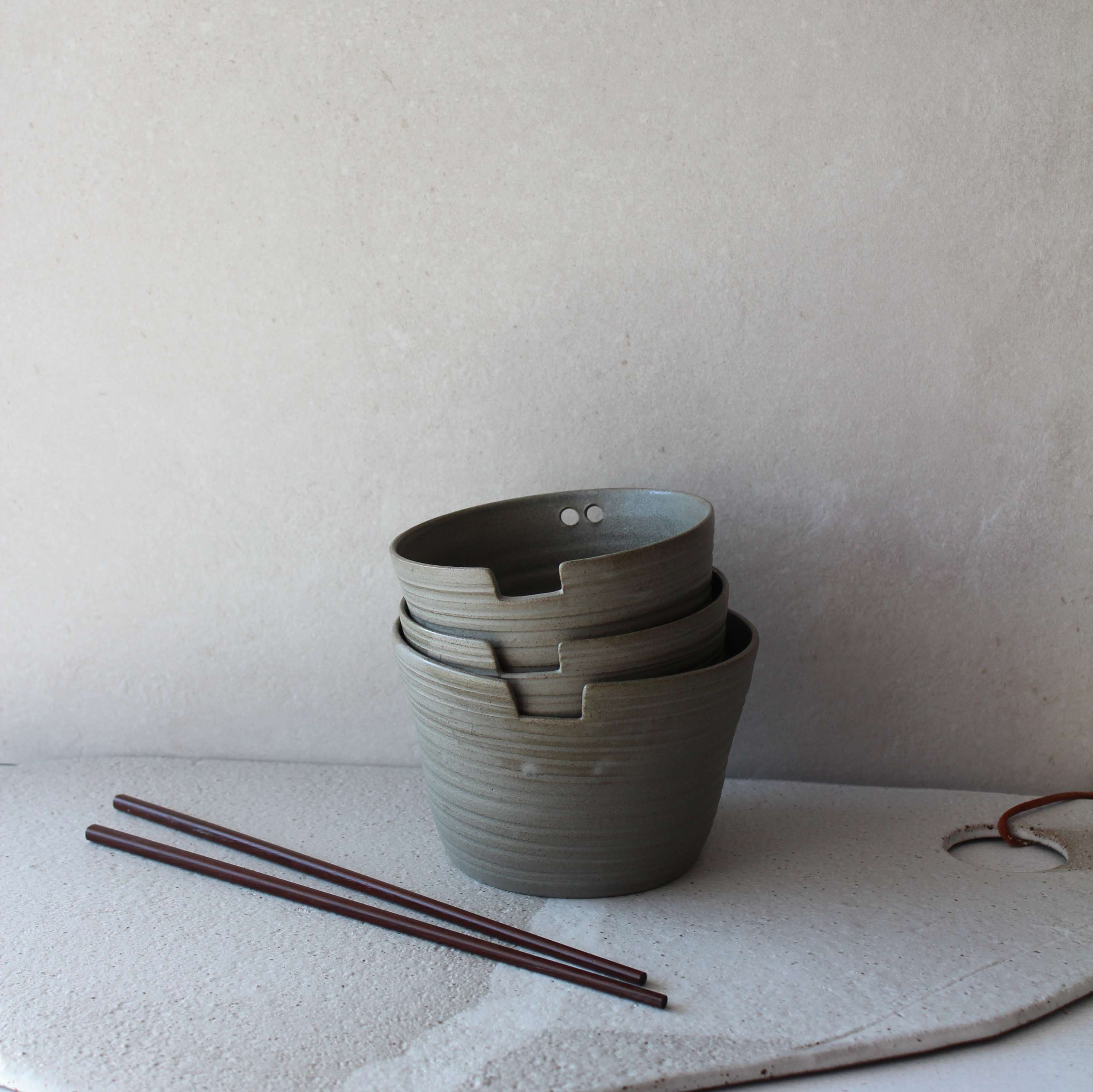 OLIVE GREEN BOWL WITH GROOVE AND HOLE FOR CHOPSTICKS