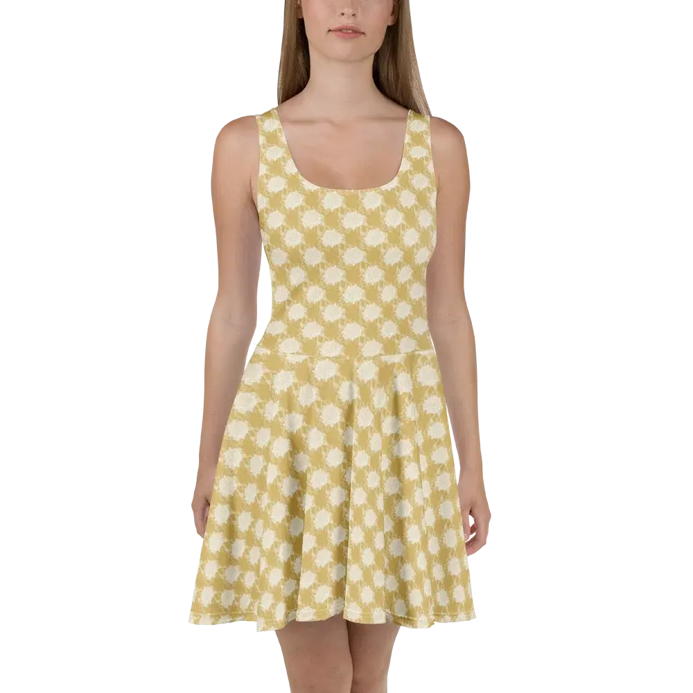 Woman in sleeveless geometric patterned dress