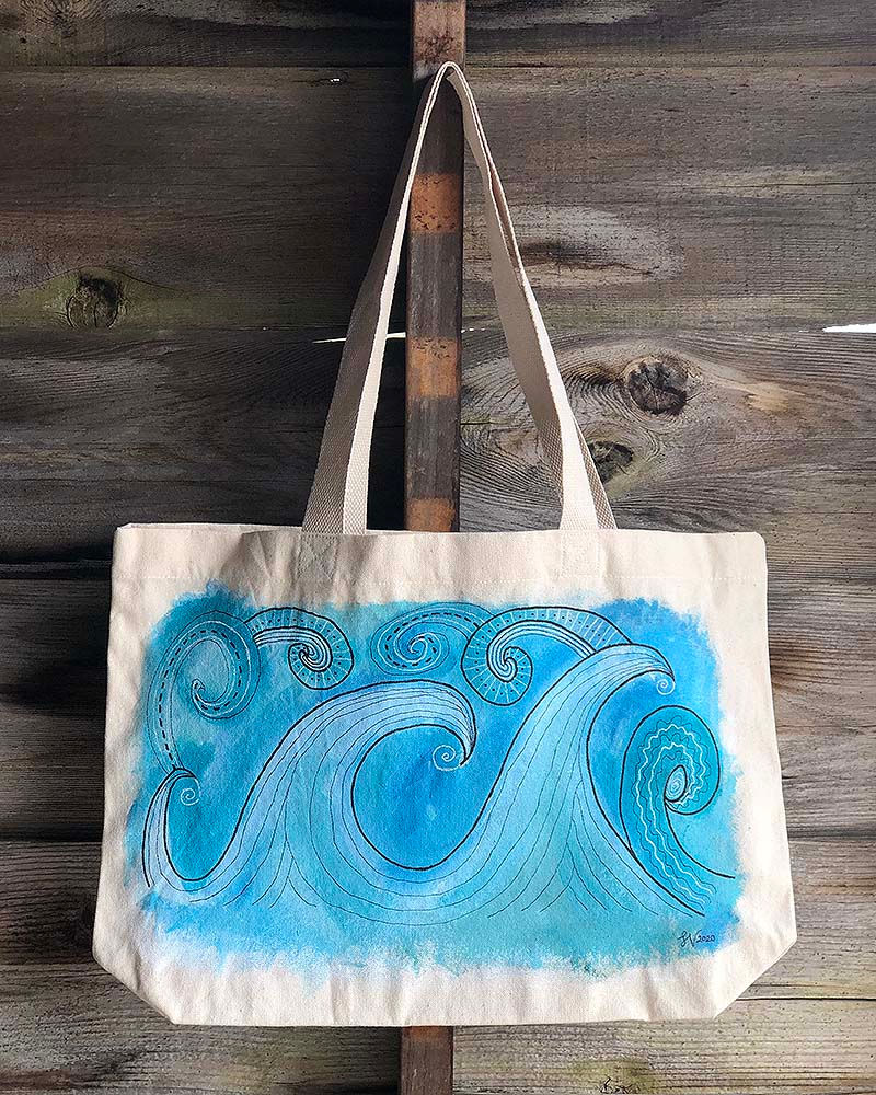 Thumbnail: Hanging painting on tote bag showing waves using shades of blue.