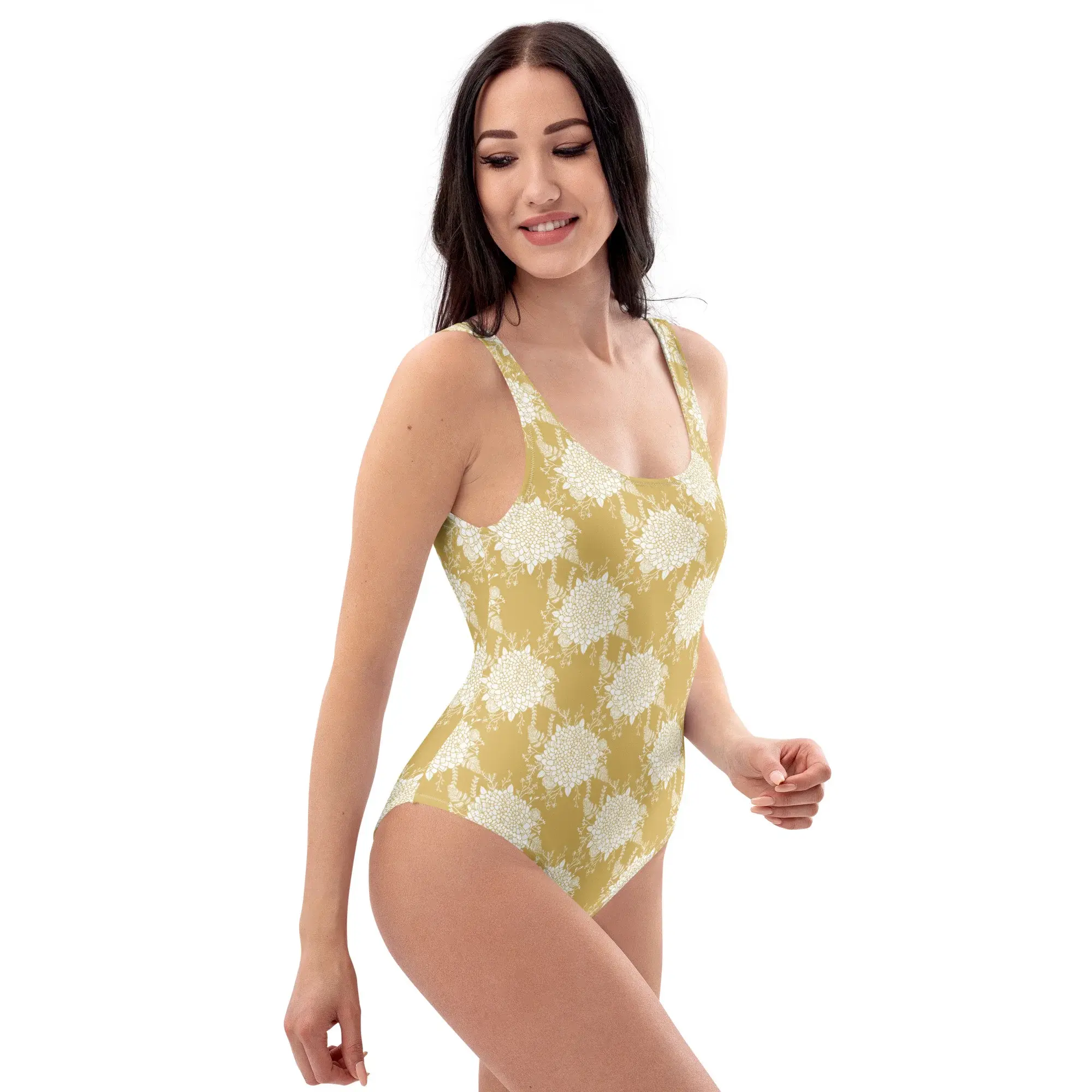 Woman in a yellow patterned one-piece swimsuit