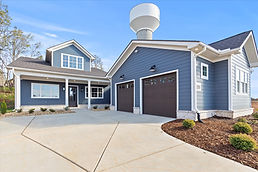 "The Nelson" plan offers attractive architectural details, an open-concept kitchen with GE Profile appliances, true custom cabinetry, and quality finishes at every turn.