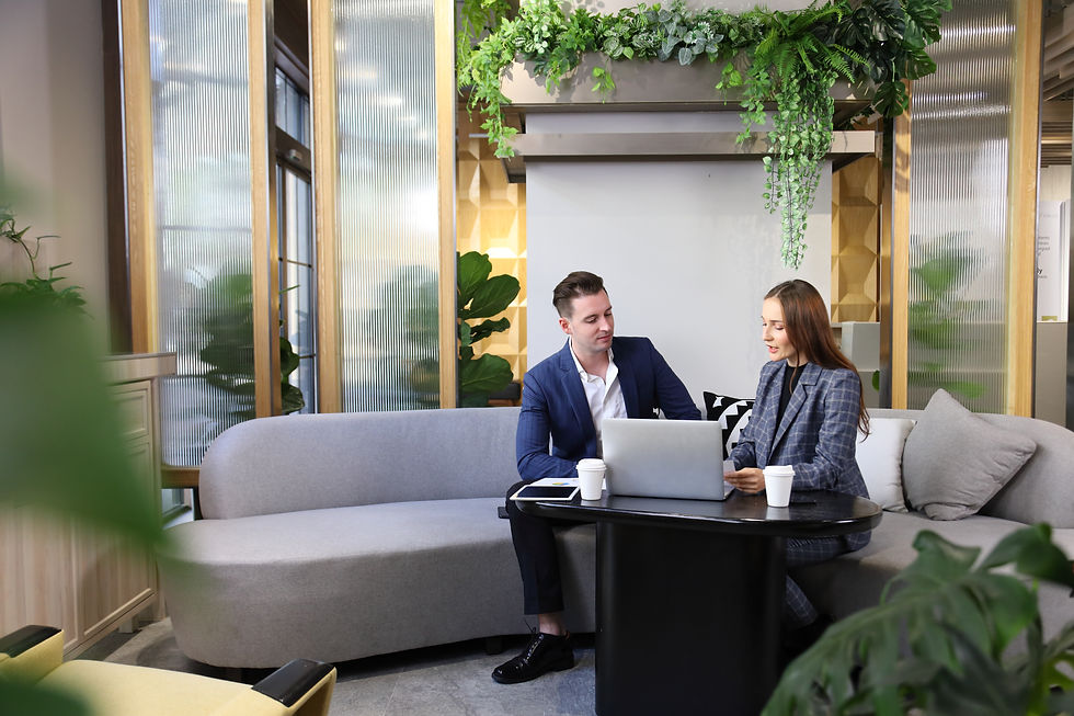 a manager providing sustainability onboarding training to a new hire