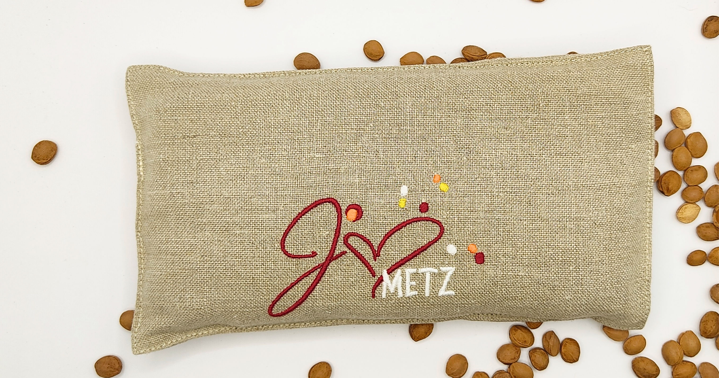 bouillotte sèche brodée et noyaux de mirabelles de lorraine