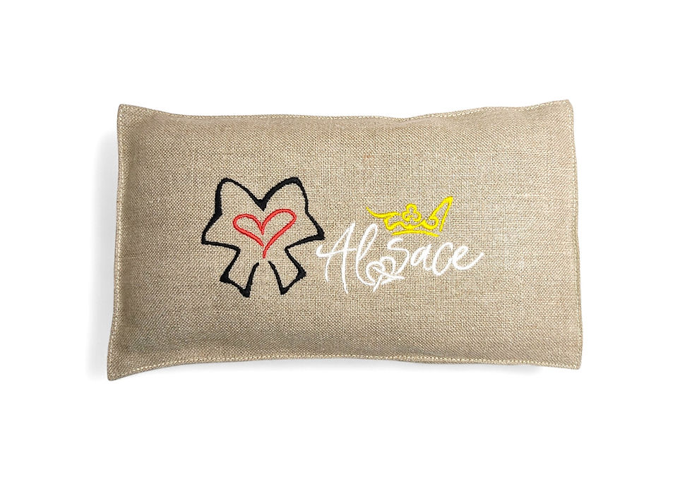 bouillotte en lin brodé garnie de noyaux de mirabelles de lorraine