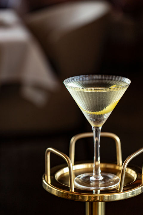 Martini cocktail stands on the table in the Italian Steakhouse in Fort Lee, New Jersey