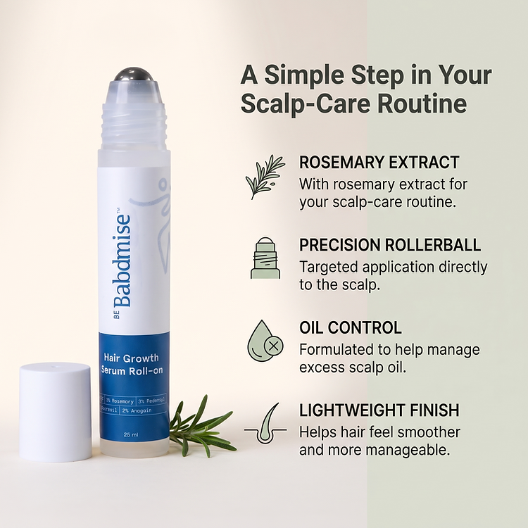 Rosemary Hair Growth Rollerball Serum in a 25ml bottle beside a sprig of rosemary