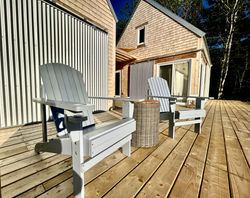 deck chairs on the spacious deck of TwoBySea cottage