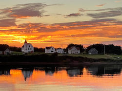 sunset over the village of Margaree Harbour, five minutes north of the cottage