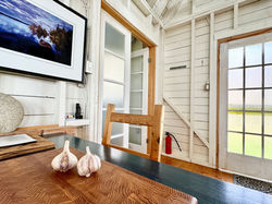 lovely photograph beside the table in DeepBlueSea Cottage kitchen