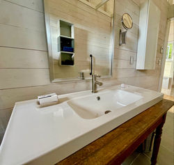 large and gorgeous bathroom with heated-tile floor at TwoBySea cottage