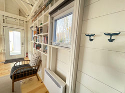 a view of the entryway with whale-tail hangers at TwoBySea cottage