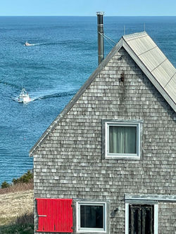 Lobster boat passing SeaSky Cottage