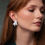 Thumbnail: Kelp earrings, silver, being worn