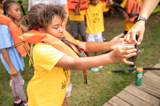 Campers participating in different outdoor activities