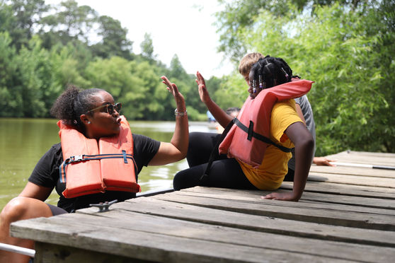 Campers participating in different outdoor activities