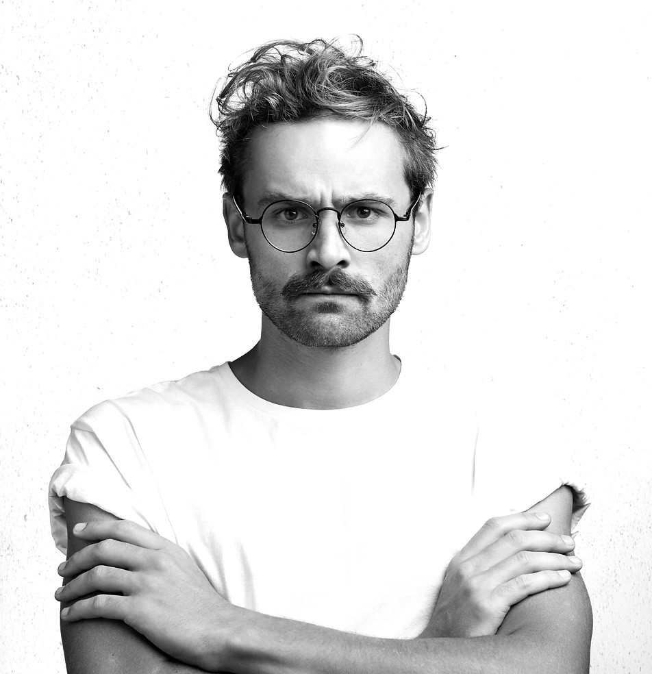 young-man-with-beard-round-glasses_edited.jpg
