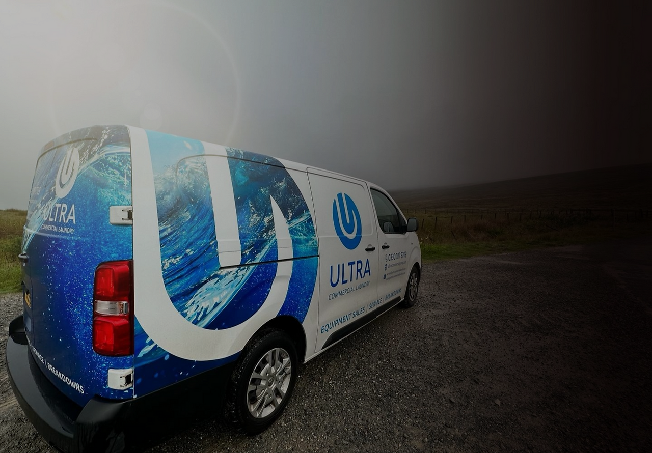 wide lens back of ULTRA Commercial Groups laundry van used to go out on nationwide servicing