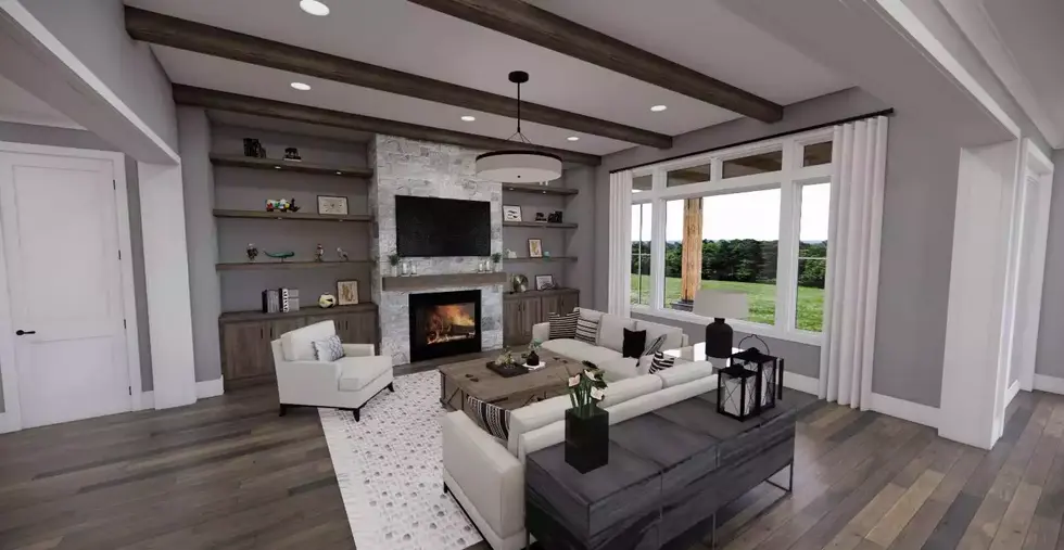 Prestige Series Weston Lake great room with fireplace and open layout