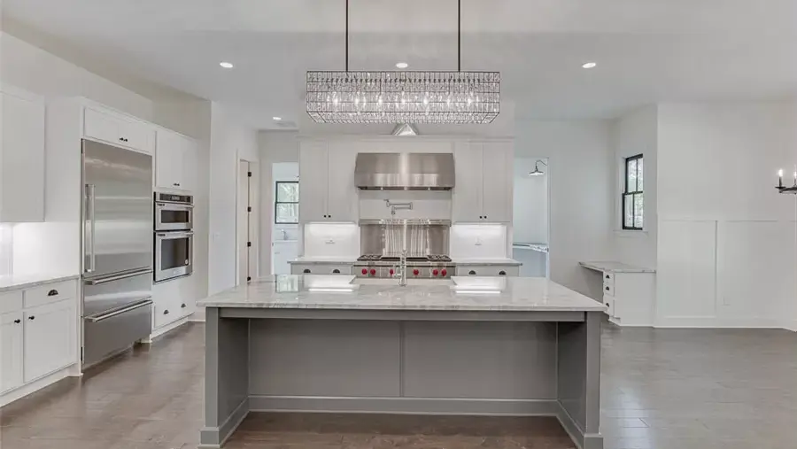 Prestige Series Millerville plan modern kitchen with large island and open layout