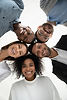 Close up vertical low angle portrait of smiling multiethnic diverse employees pose togethe