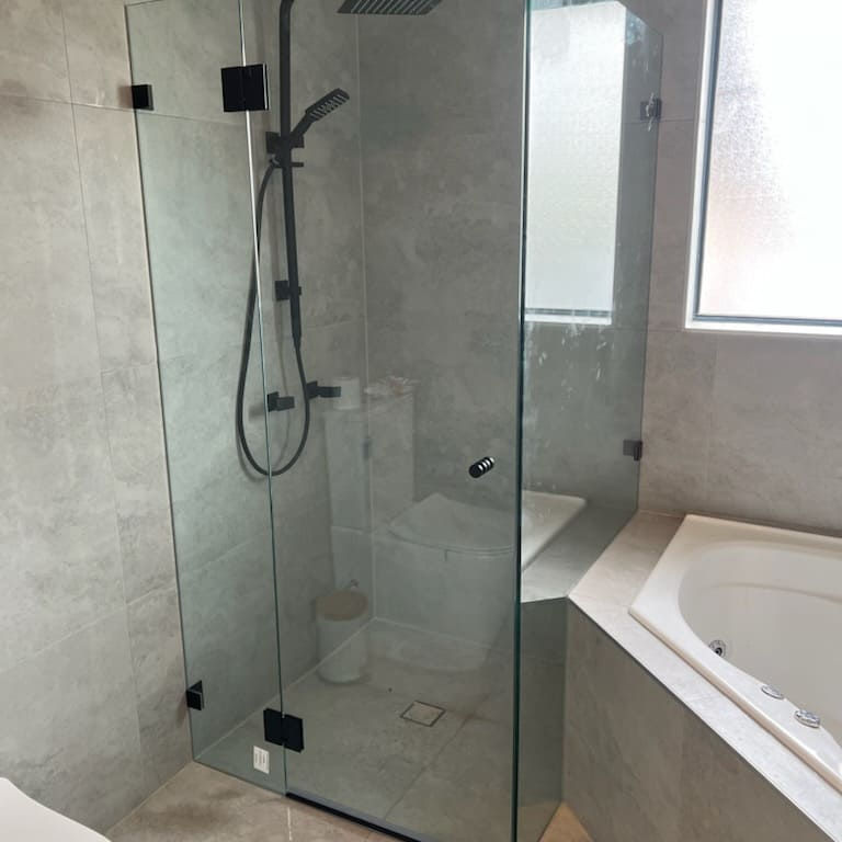 Thumbnail: copy of Frameless L shape Shower screen