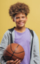 smiling-authentic-african-american-boy-teenager-player-holding-basketball-looking-camera.j