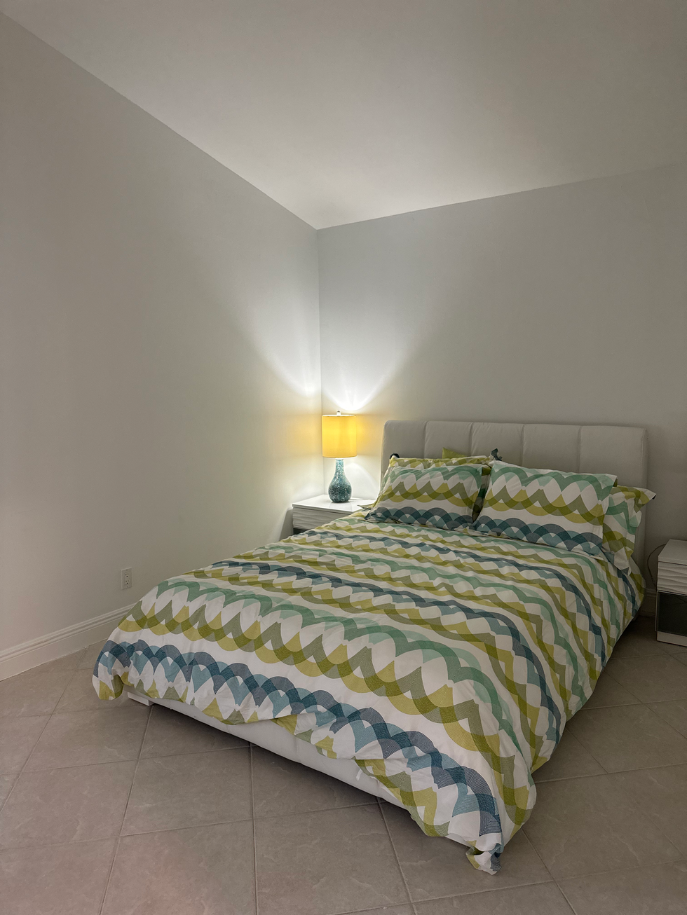 "Large windows in a living room after construction cleaning, free of dust and debris."