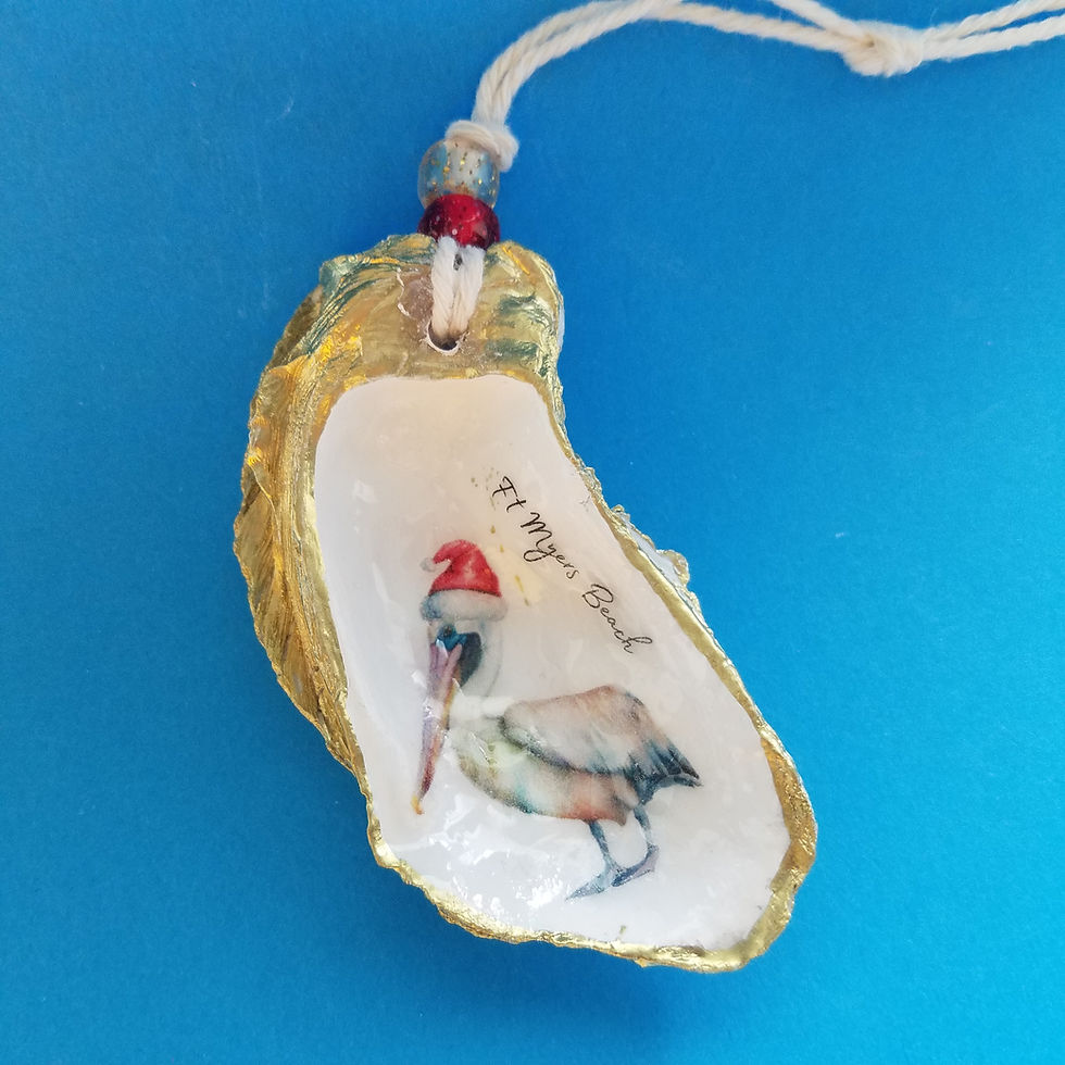 Thumbnail: Oyster Shell Decoupage Ornament - Pelican in Santa Hat