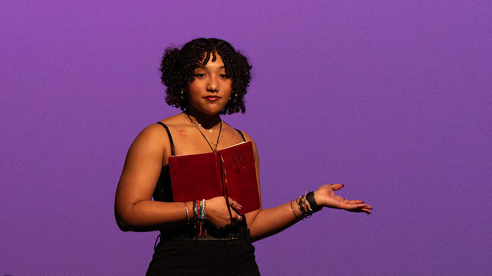 Performer delivering the monologue ‘The Little Coochie Snorcher That Could’ on stage during The Vagina Monologues.
