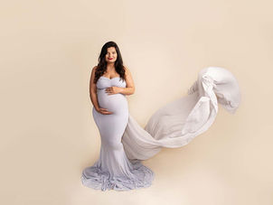 Photo of pregnant lady in grey dress in Maternity pictures Hedon