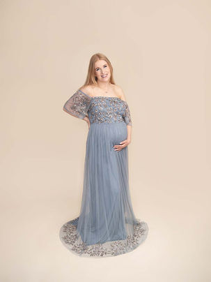 Photo of pregnant lady in blue sparkly dress in pregnancy photoshoot Driffield