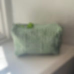 Large Cotton Washbag - Green Stripe displayed on window sill