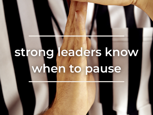 Image of a referee doing a time out signal with the words "strong leaders know when to pause" superimposed