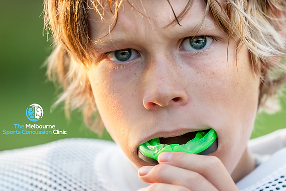 boy with mouthguard concussion.png