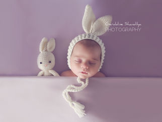 Séance photo nouveau né avec une jolie petite fille de 1 mois