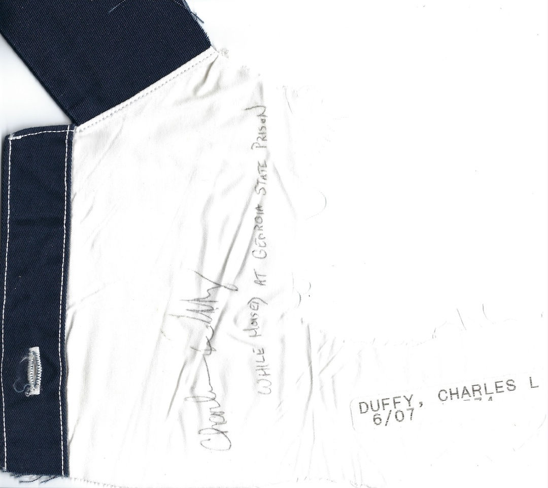 Charles Duffy prison shirt