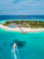 Aerial view of a tropical resort for Asili Travel Advisory.