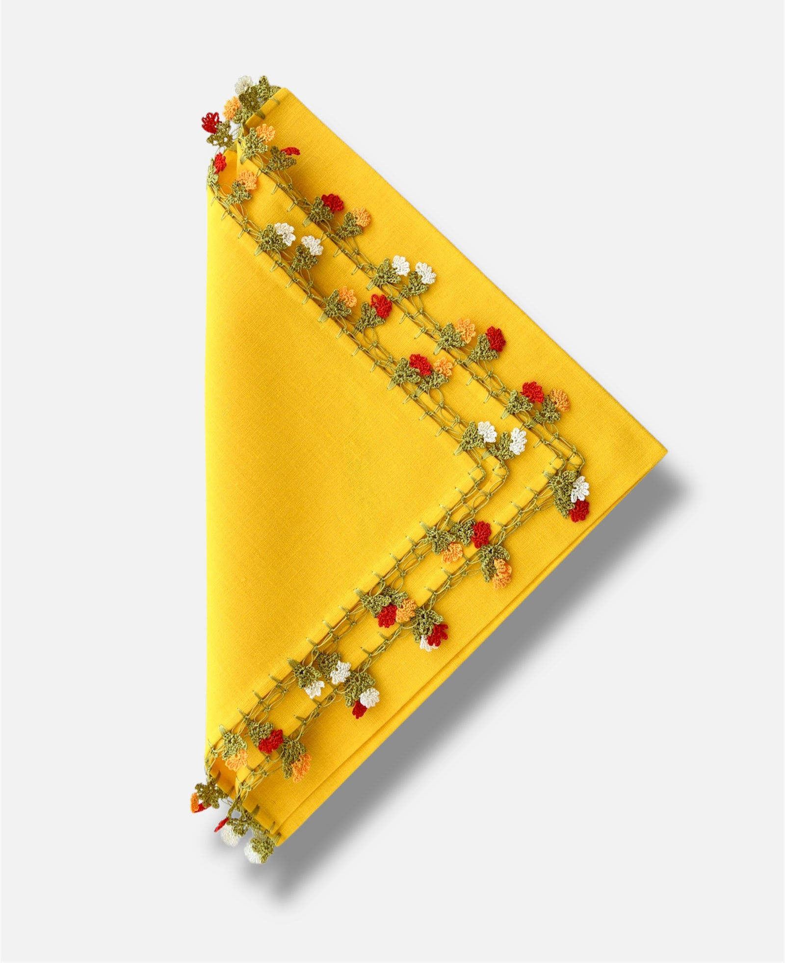 Hand-embroidered Mediterranean linen napkin by Mar & Terra, artisan-made with floral detailing