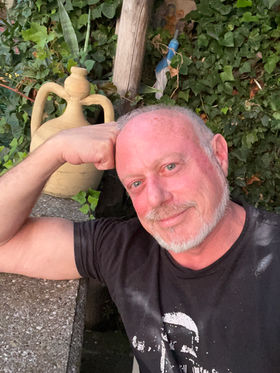Neil Laird in a garden setting.