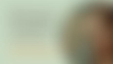 high performer sitting quietly at window — burnout nervous system exhaustion that rest doesn't fix