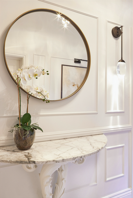 Ornate design console table with marble top in the victorian entrance hall in Hale, Cheshire, Greater Manchester
