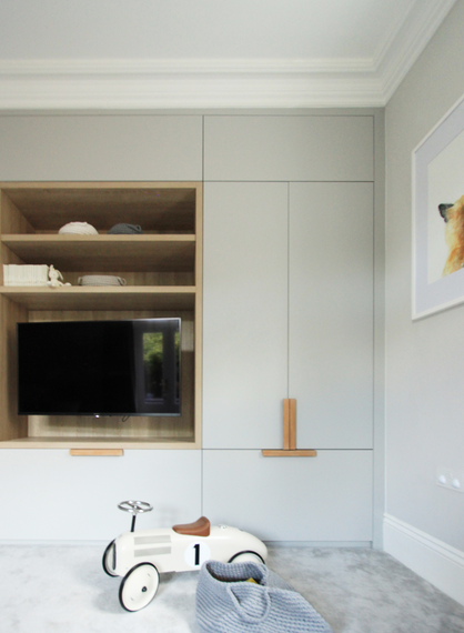 The playroom designed by Interiors by Ingrid features bespoke storage